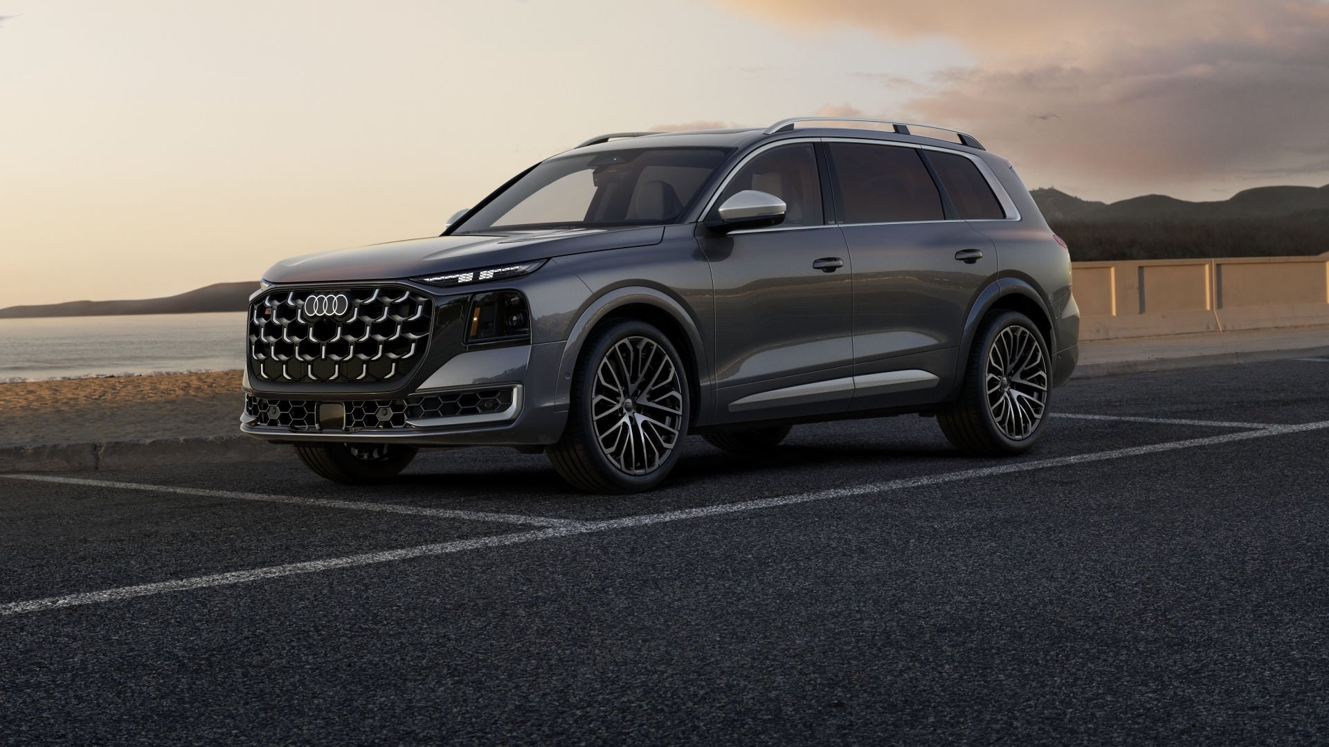 Right profile view of an Audi Q9 driving